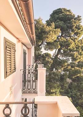 Puglia, Italy I Photography of an Italian seaside villa at sunset pastel light between architecture and Mediterranean nature with majestic pine trees and the soft summer light of the Amalfi coast