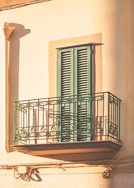 Puglia, Italy I Photography of window and shutters of a building facade bathed in summer sunlight and iron balconies in the streets of Bari with a Mediterranean touch as in Rome, Milan or Venice