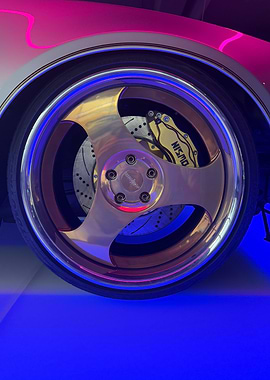 Gold Car Wheel with Nismo Brakes