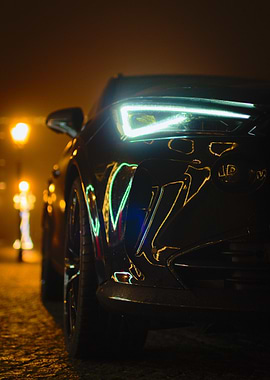 Black Car Headlights at Night
