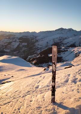 Ski on Snowy Mountain Peak