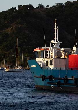 Blue Cargo Ship at Sea