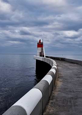 Lighthouse on Curved Pier