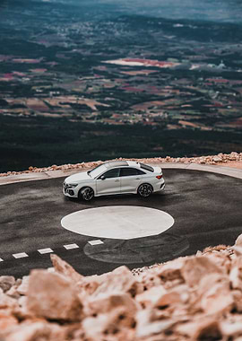 White Audi RS3 on Mountain Road