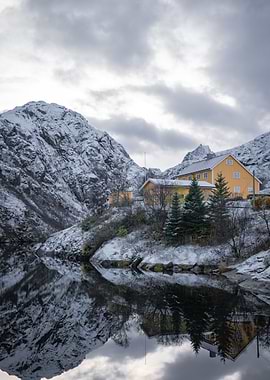 Snowy Mountain Cabin Reflection