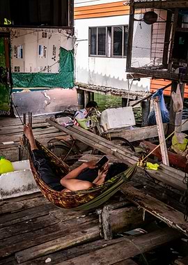Man Relaxing in Hammock