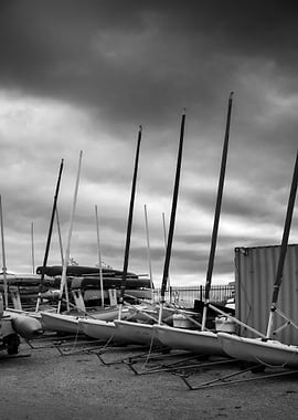 Sailboats Moored Under Cloudy Sky