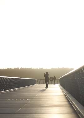 Silhouettes on a Pier
