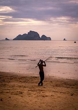 Man Fishing on Beach