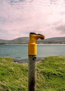 Yellow Boot on a Post