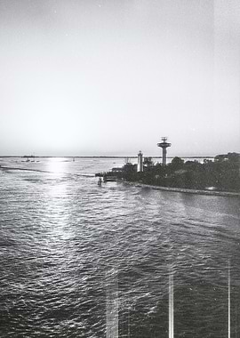 Lighthouse and Tower by the Sea