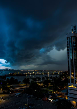 Cityscape Under Storm Clouds