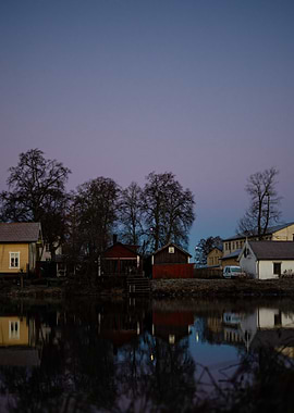 Reflective Houses at Dusk