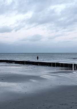 Solitary Figure on Beach
