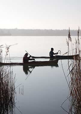 Kayaking on a Misty Lake