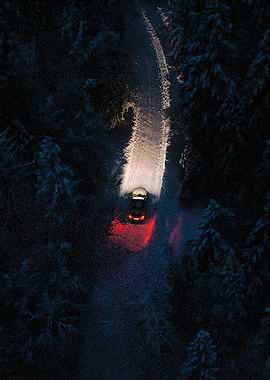 Car on Snowy Road
