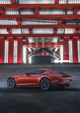 Red Sports Car Under Modern Architecture