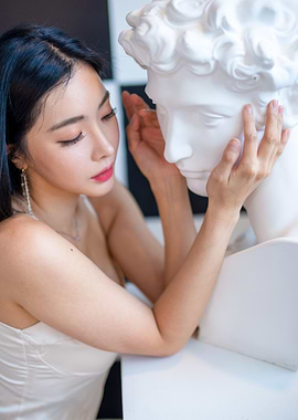 Woman Touching Sculpture