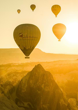 Hot Air Balloons Over Mountains