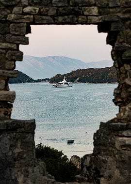 Yacht Through Stone Arch