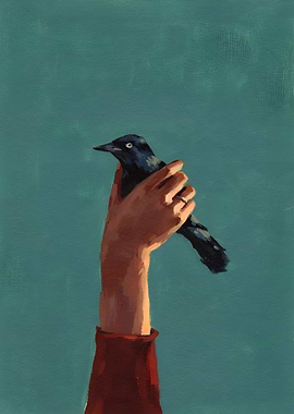 Hand Holding a Bird