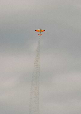 Yellow Plane Smoke Trail