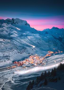 Snowy Mountain Village at sunset in Zürs am Arlberg