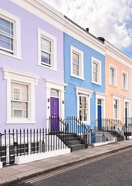 London, England I Pastel facades of Notting Hill streets captured in colorful British architecture to the purple blue and pink dollhouse aesthetic of an everyday lifestyle londoner street scene