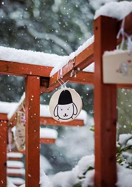 Cute Mascot at Snowy Shrine in Japan