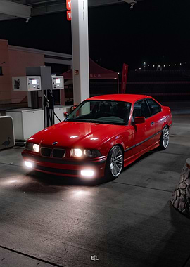 Red BMW at Gas Station