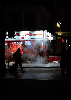 Nighttime City Street with Pizzeria New York