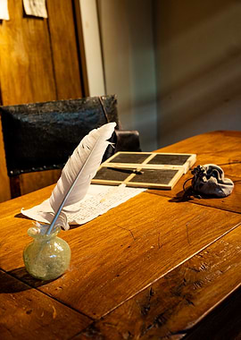 Quill Pen and Inkwell on Desk