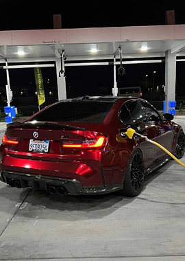 Red BMW M3 at Gas Station