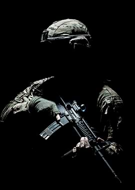 Silhouetted Soldier with Rifle