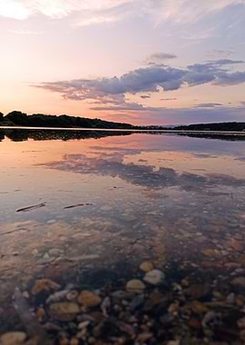 Sunset Reflection on Calm Lake