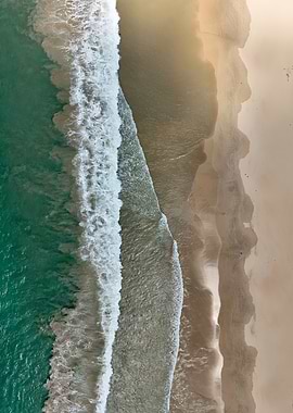 Aerial View of Ocean Waves and Beach