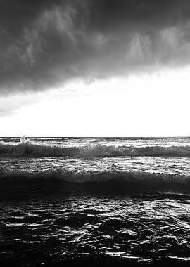Monochrome Ocean Waves Under Stormy Sky