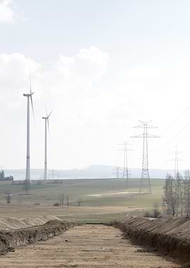 Wind Turbines and Power Lines Landscape