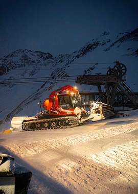 Snow Groomer at Night