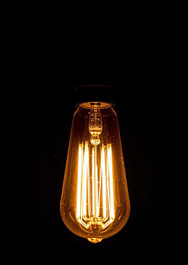 Edison Bulb on Black Background