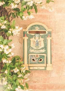 Tuscany, Italy I Italian ceramic mailbox in Pienza with star jasmine on rustic stone wall in vintage countryside photography with Mediterranean pastel aesthetic, poetic dolce vita Italian summer vibes