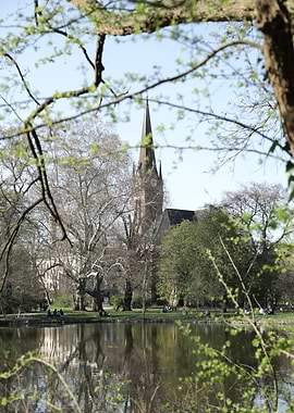 Church Tower Overlooking Park Lake