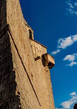 Stone Tower with Clock and Bell