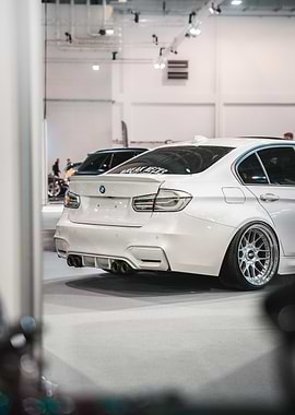 White BMW M3 Car Rear View With Chrome Rims