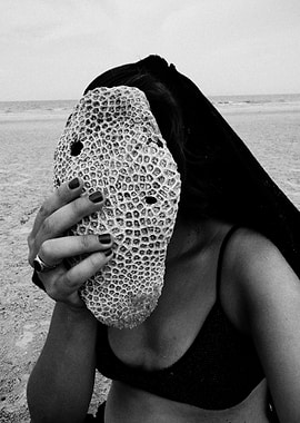 Coral Mask on Beach