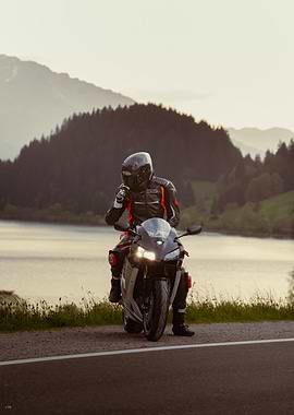 Motorcycle Rider by Lake
