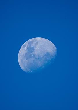 Moon in Blue Sky