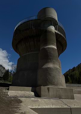 Concrete Tower Structure Against Blue Sky