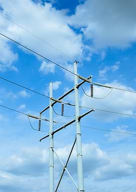 Electrical Tower Against Blue Sky