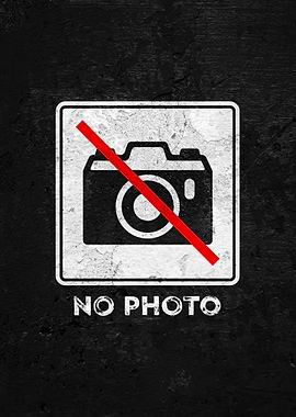 No Photo Sign on Black Wall